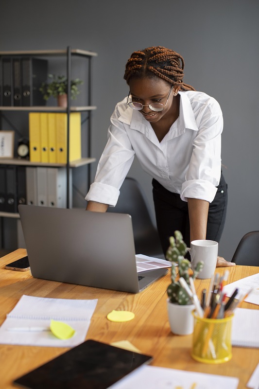 portrait-young-woman-working-her-laptop-startup-company.jpg